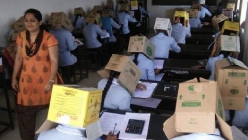 Σχολείο στην Ινδία ανάγκασε τους μαθητές να βάλουν κούτες στο κεφάλι τους για να μην αντιγράφουν (pics)