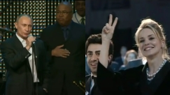 «Το πιο περίεργο πράγμα που θα δεις»: Ο Πούτιν τραγουδάει για τα παιδιά και η Σάρον Στόουν από κάτω, κάνει το σήμα της νίκης (vid)