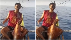 «Squid Game» στις Φιλιππίνες: Τεράστιο καλαμάρι έλουσε με μελάνι ψαρά αφότου το έβγαλε από τη θάλασσα (vid) 