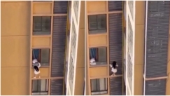 Έσπρωξε την ερωμένη του στο μπαλκόνι για να μην τους πιάσει η σύζυγος: Κρεμόταν από τον 10ο όροφο (vid) 