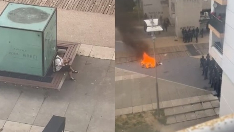 Συγκρούσεις στη Γαλλία: Ατάραχος άντρας συνεχίζει να τρώει σάντουιτς την στιγμή που διαδηλωτές μάχονται με την αστυνομία (vid)