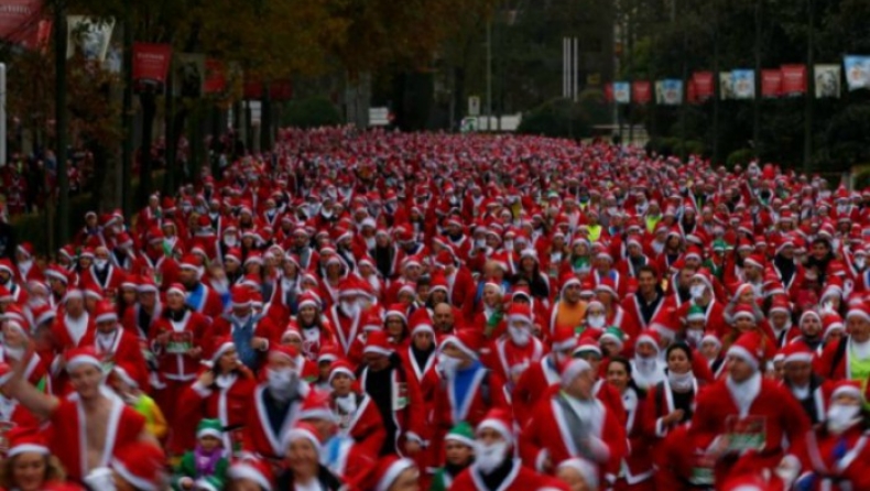 Κούρσα χιλιάδων Άγιων Βασίληδων στο κέντρο της Μαδρίτης (pics)