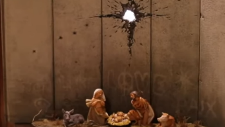 Η «ουλή της Βηθλεέμ»: Το έργο του Banksy με την φάτνη και την τρύπα από οβίδα (vid)