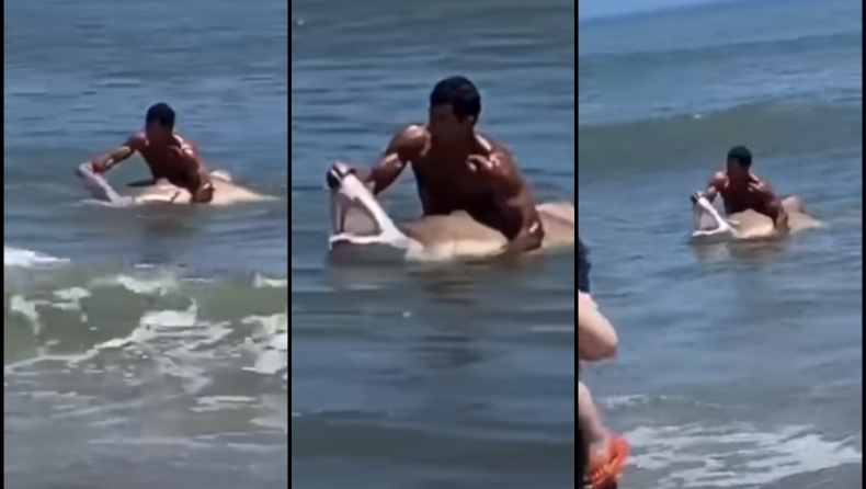 Ατρόμητος κολυμβητής έπιασε με τα χέρια του καρχαρία και του άνοιξε το στόμα (vid)