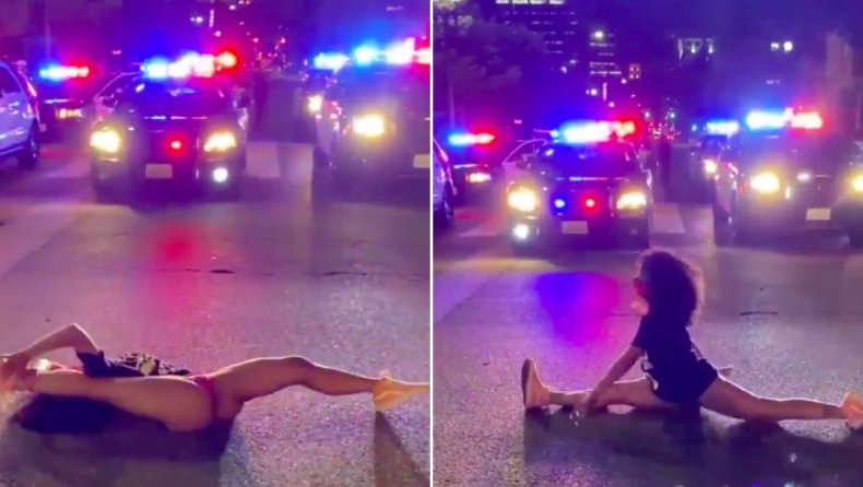 Ημίγυμνη χορεύτρια διαμαρτύρεται για την αστυνομική βία κάνοντας twerking μπροστά από περιπολικά (vid)